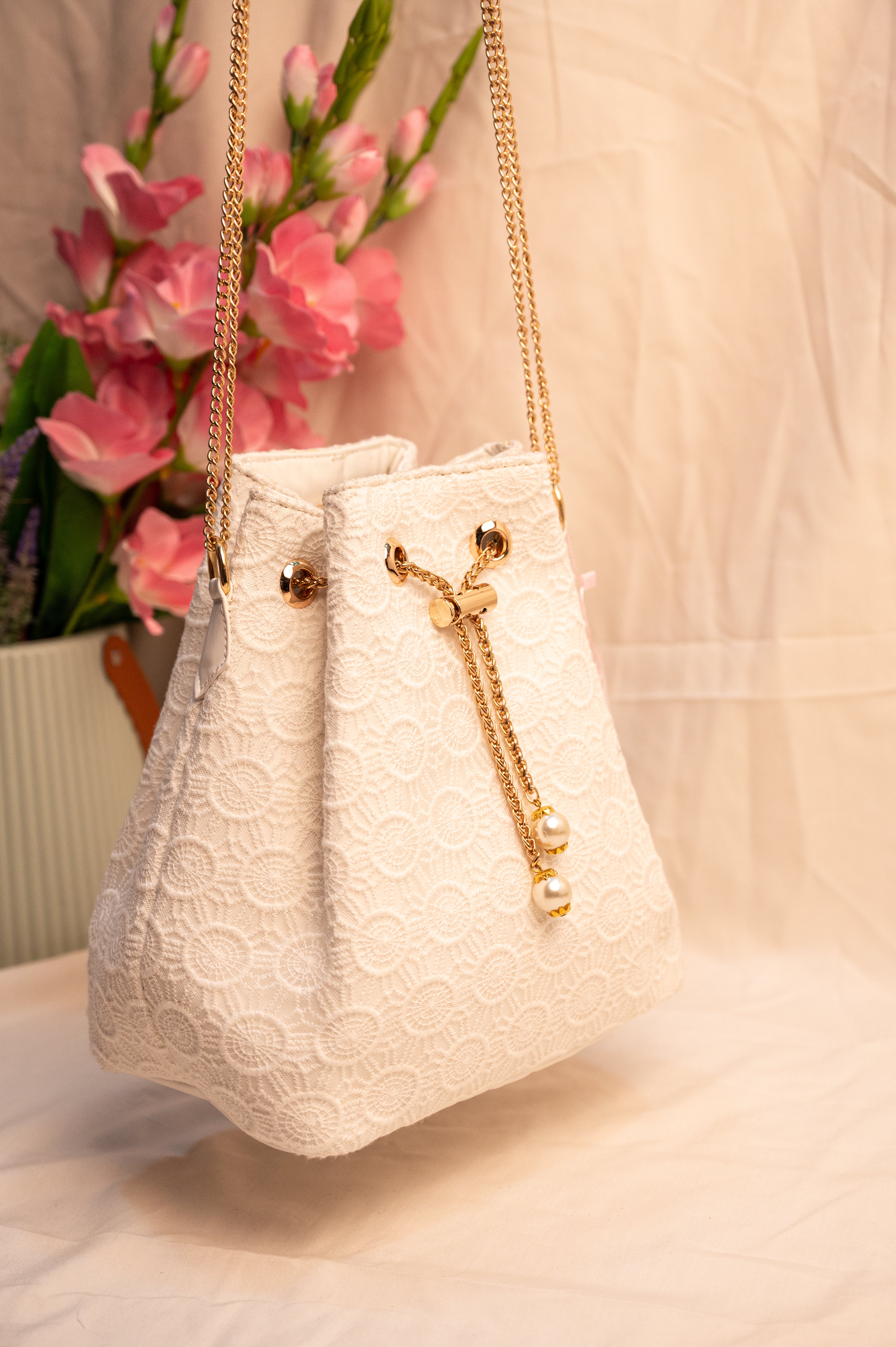 Ivory noor bucket sling