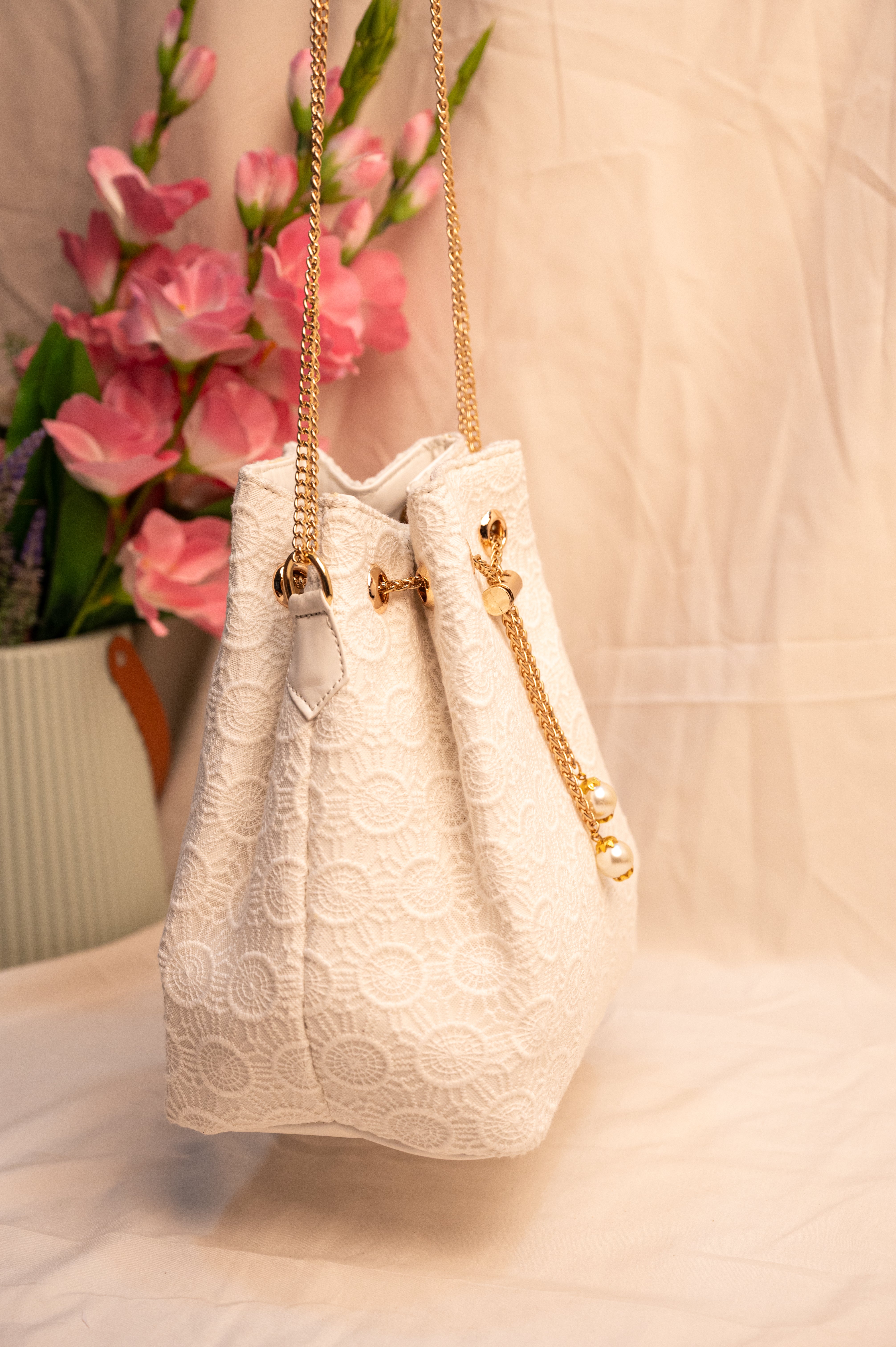 Ivory noor bucket sling