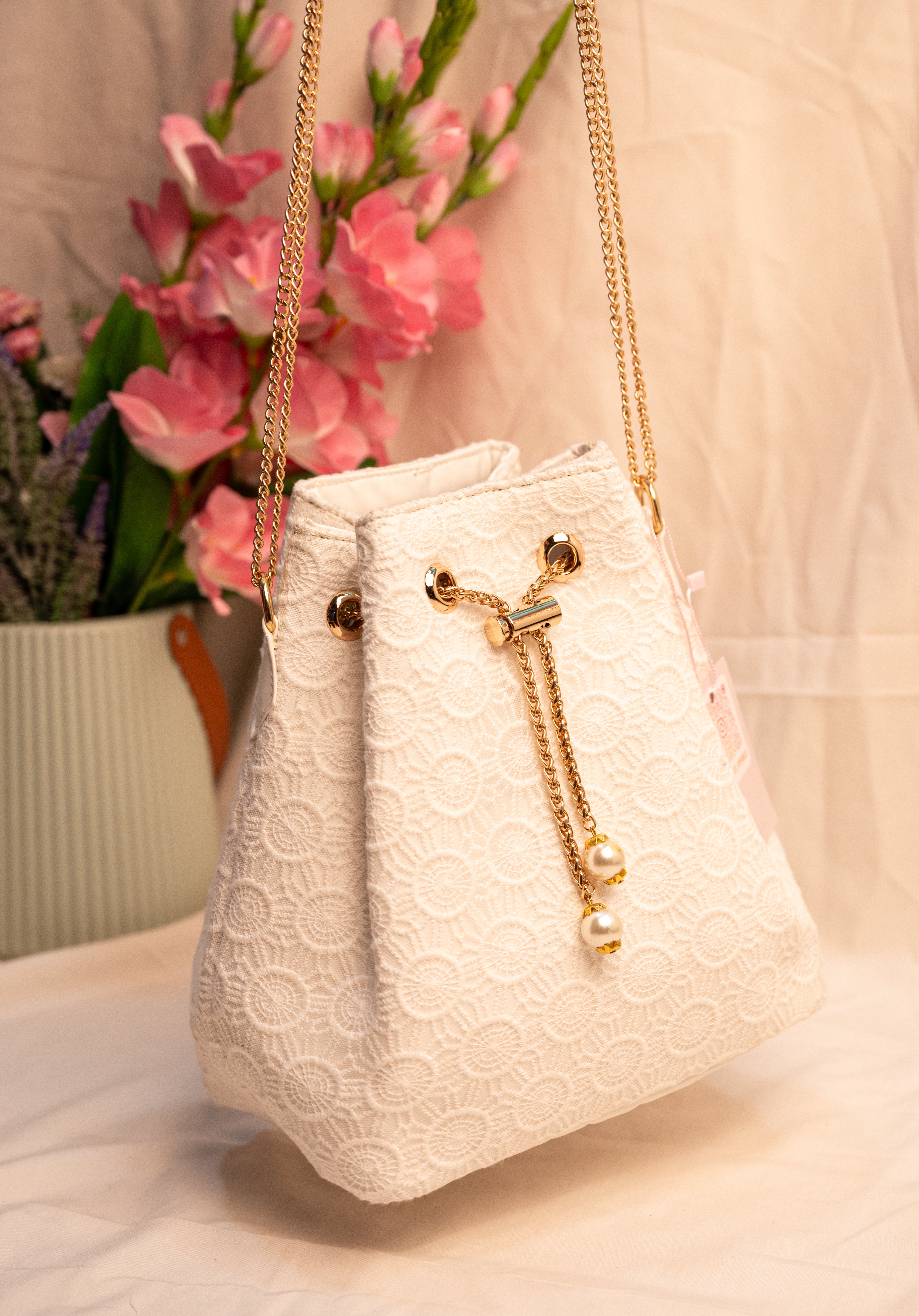 Ivory noor bucket sling